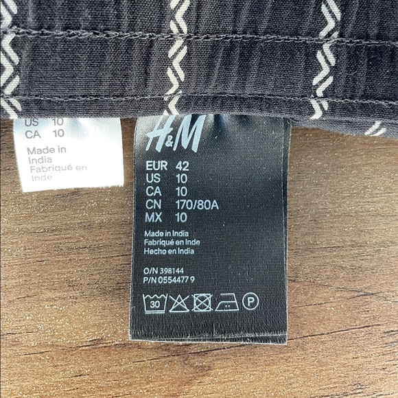 Pinstripe light trousers - Picture 2 of 2